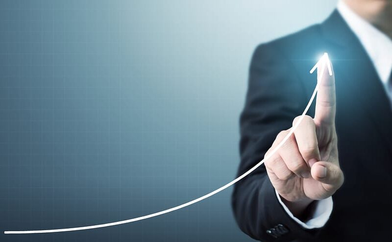 bigstock--203450716 Businessman hand touching point graph growth or increase business chart Growing up revenue and development concept