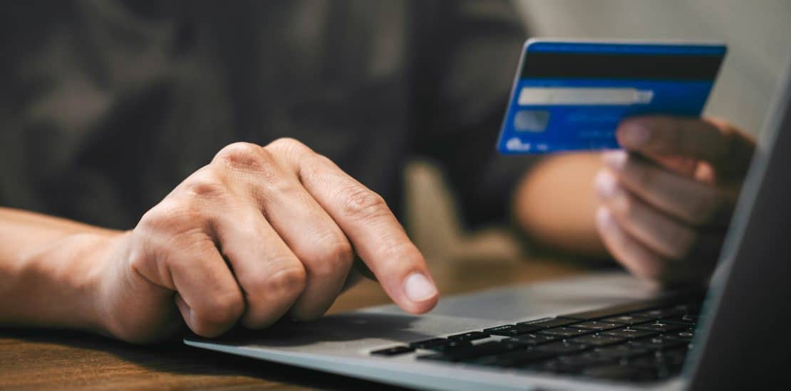 Businessman Holding Credit Card And Typing On Laptop For Online Businessman holding credit card and typing on laptop for online shopping and payment makes a purchase on the Internet, Online payment, Business financial and technology.